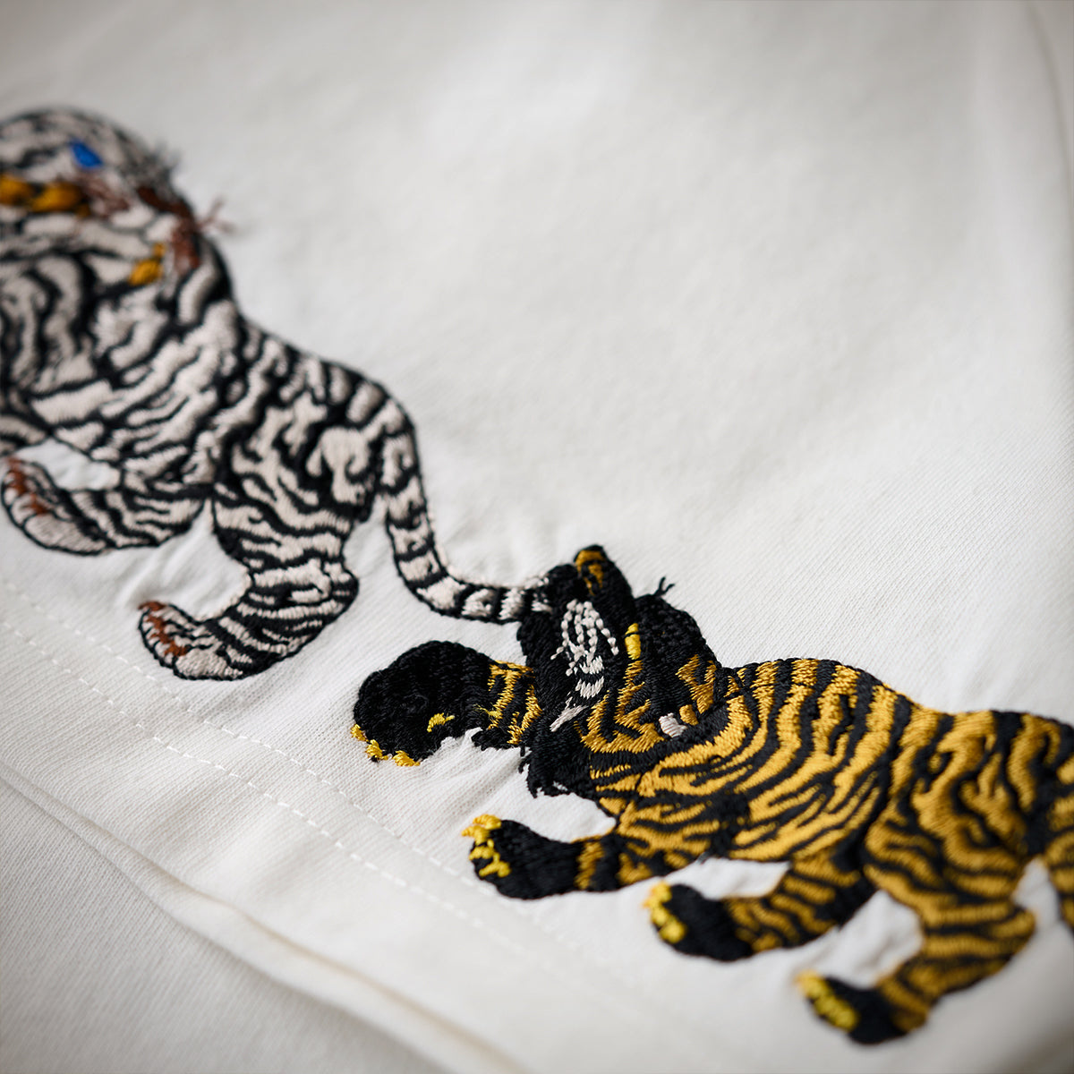 Tigers Biting Their Tail Sleeve Embroidery Cotton Tee